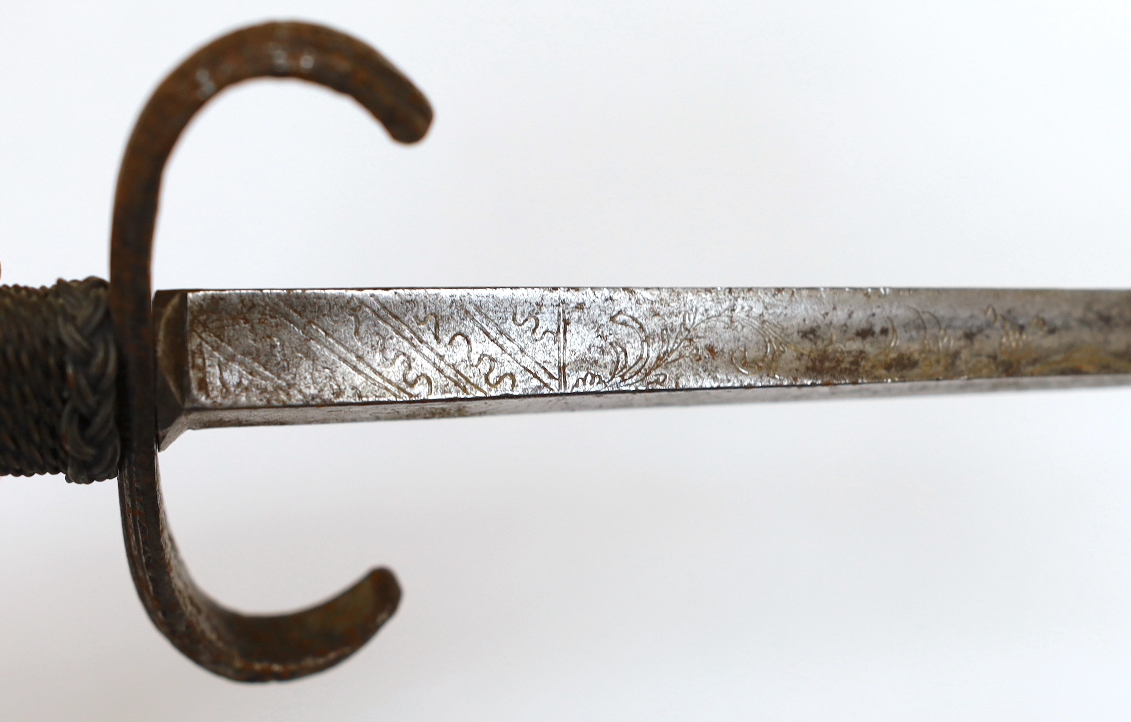 A reproduction stiletto and dagger, stiletto with engraved steel blade, steel pommel and quillon, and wire grip, longest 35.5cm